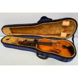 A modern student's violin, with pine top nd two-piece satinwood back, internal paper label for