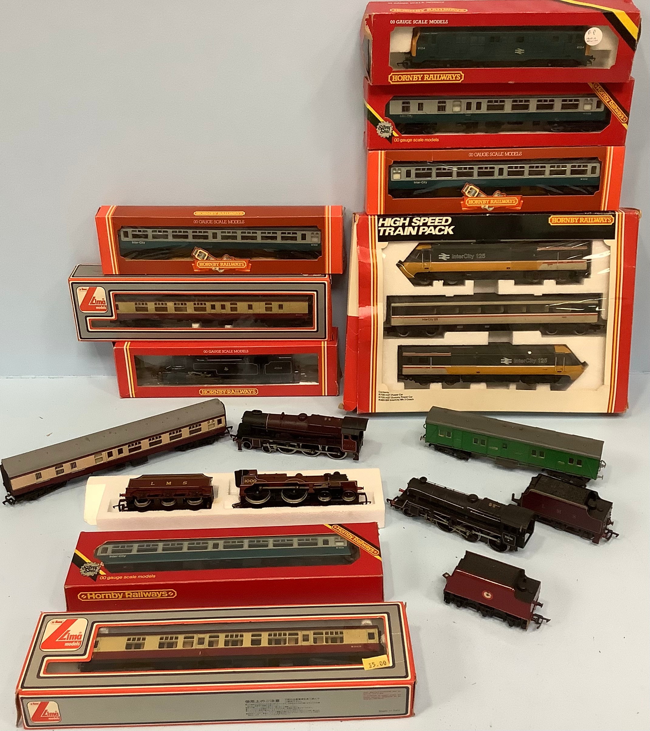 A quantity of various boxed Hornby and Lima 00 gauge model trains and coaches, to include Hornby