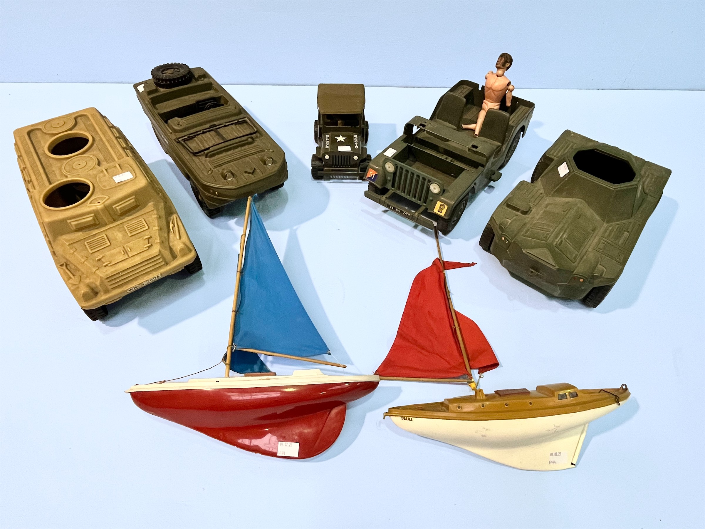 Four various unboxed Action Man military vehicles, to include ‘Amphibious Jeep’ (26CC04) and ‘Desert