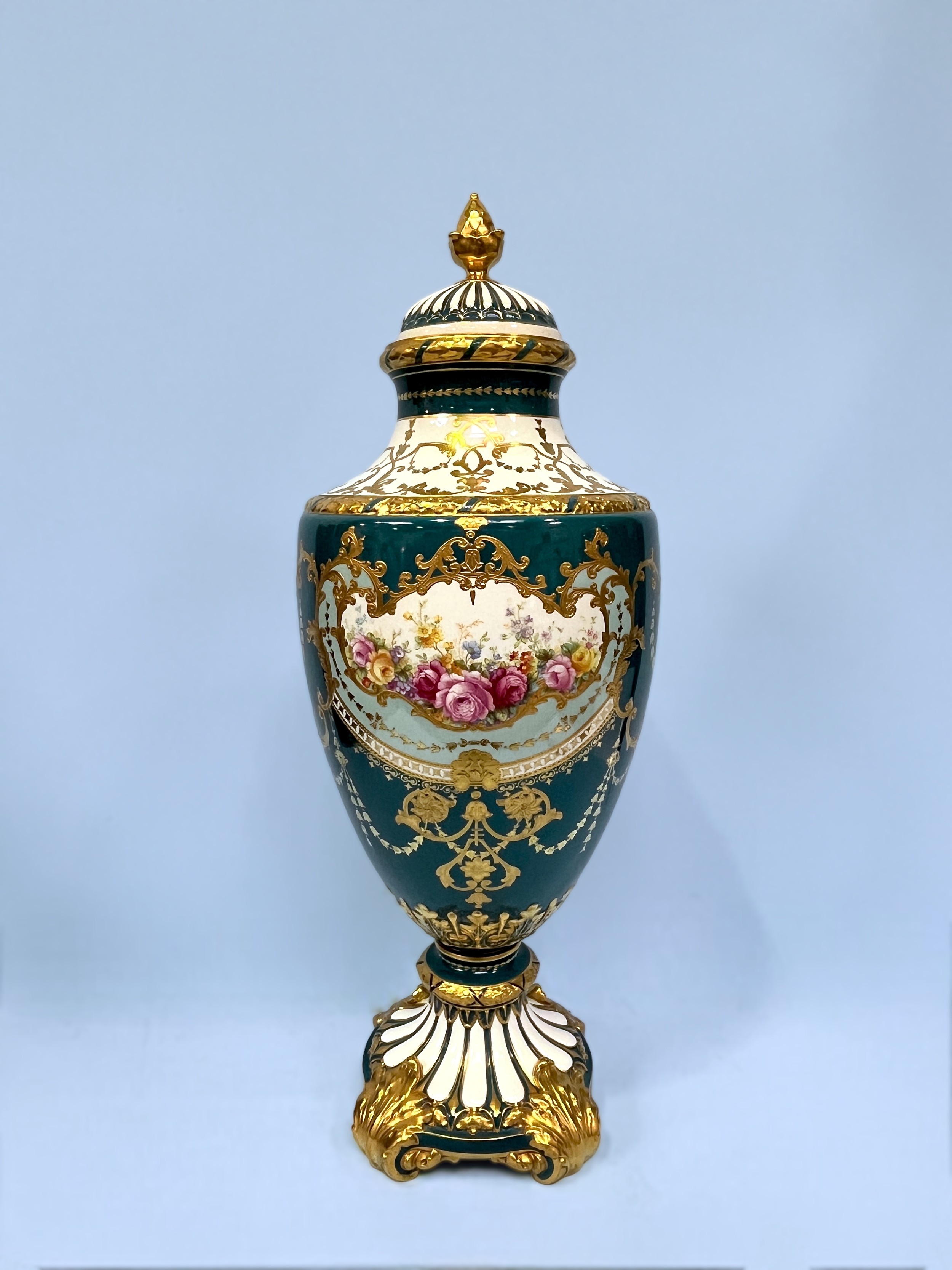 A large Royal Bonn printed porcelain urn and cover, central panel of floral design, painted blue and - Image 2 of 2