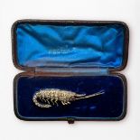 An antique gold and silver brooch modelled as a shrimp, the body and tail set with approximately