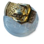 A 9ct gold buckle ring, with engraved design, weighs 8.3 grams, 10mm in width.