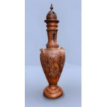 A large terracotta Orientalist style urn/vase, of inverted baluster form, with pierced and worked
