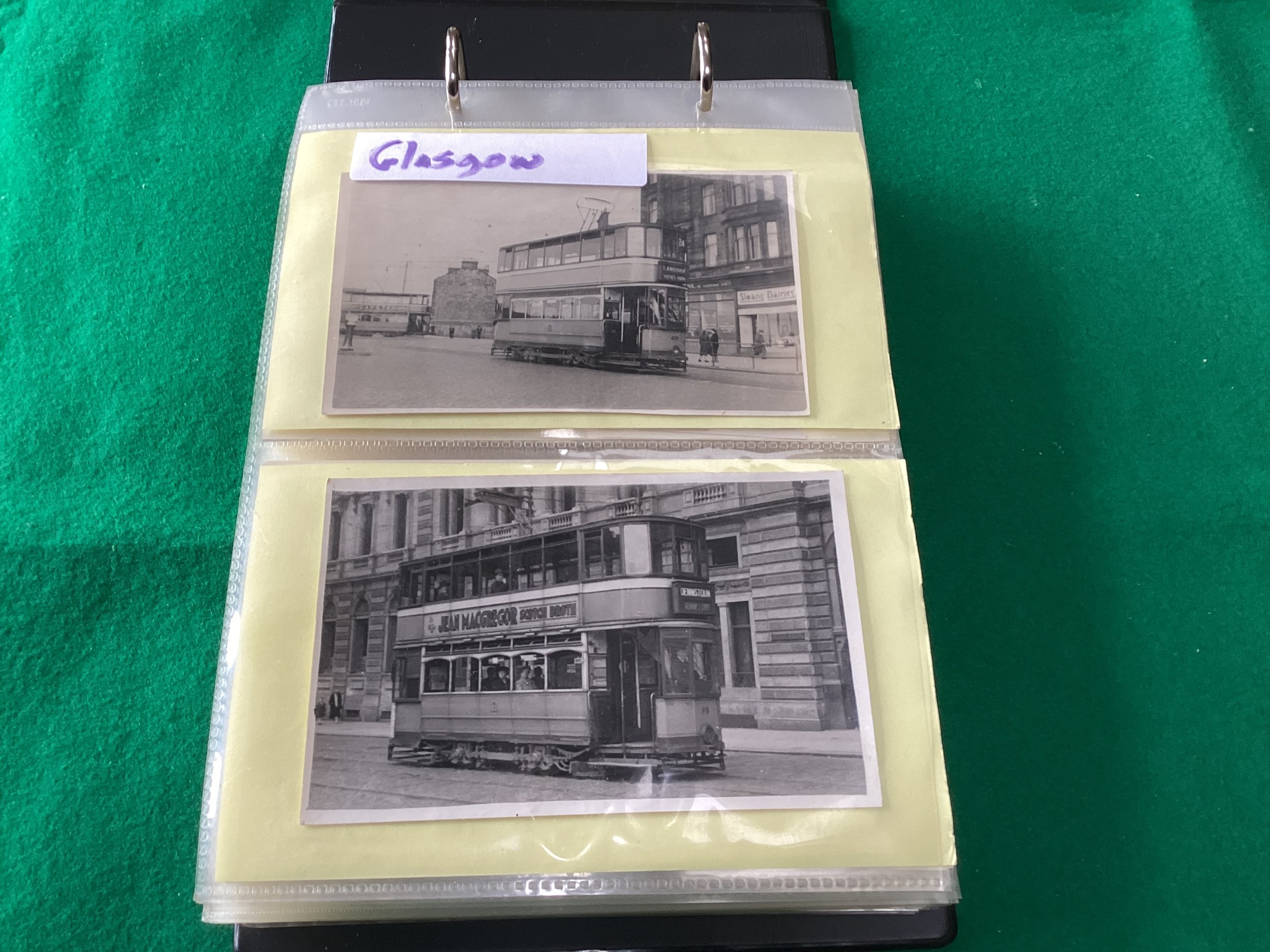 An album containing 104 postcard-size tram photographs – some on postcard-style card. This lot