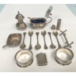 A small collection of assorted silver items comprising a set of six small .800 grade spoons, a vesta