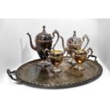 A four-piece silver-plated teaset, of ovoid form raised on spreading circular foot, foliate finials,