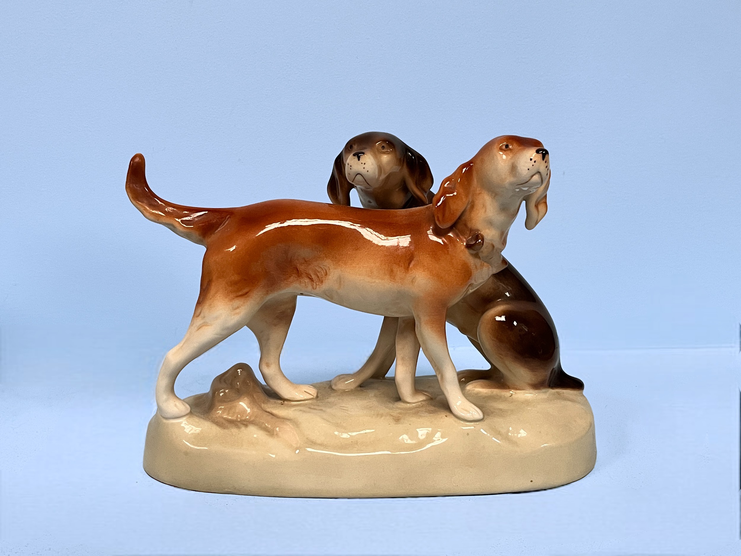A large Royal Dux potter Pike, together with a Royal Dux pottery figure-group loaf two dogs, largest