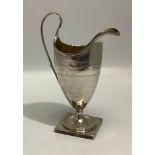 A George III silver small ewer by Duncan Urquhart & Naphtali Hart, with gilt interior, raised on