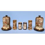 Japanese Satsuma pottery/ Meiji period, including a pair of bell-shaped blue-ground Satsuma vases,