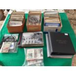 See photo 1 for all items in this lot which comprise modern and standard-size postcards, photos