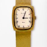 A vintage gents 14k gold Bulova Dior wristwatch, the white enamel dial with Roman numerals