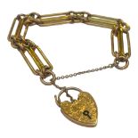 A 9ct yellow gold double elongated link bracelet, with heart shaped lock, weighing 25.8 grams.