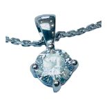 An 18ct white gold solitaire diamond pendant, the round brilliant cut diamond weighing 0.67cts, is