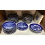 A collection of thirty-four Royal Copenhagen blue and white annual Christmas plates, dates