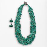 A turquoise necklace formed of multiple pebbles of naturalistic form, with white metal clasp,