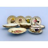 A 17-piece early 19th century Derby porcelain Botanical dessert service, each piece finely painted