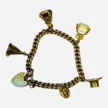 A 9ct gold lady’s charm bracelet, five charms, including a top-hat, a teepee, and a helmet etc, with