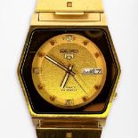 A vintage gold-plated gents automatic Seiko 5 wristwatch, the circular gilt dial with applied dot