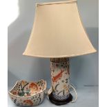 A painted cylindrical lamp, modelled as a converted Oriental vase, decorated with Koi and pond
