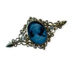 A 9ct gold cameo brooch with elongated filigree setting, weighs 5.3 grams.