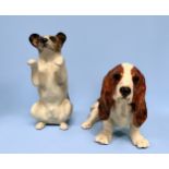 Two large Jenny Winstanley pottery figures of dogs, a Bassett Hound and a Jack Russell, with factory
