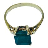 A 14ct yellow gold dress ring, claw set with a square shaped emerald, estimated weight 1.50cts, ring