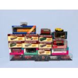 Eighteen assorted boxed die-cast scale model vehicles, comprising, a Burago 1/32 2011 Red Bull