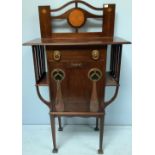An Art Nouveau mahogany small standing cabinet/music cabinet, the top with raised and pierced