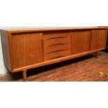 A 1960’s Danish teak sideboard by Axel Christensen for ACO Møbler Danish Mobler, with three