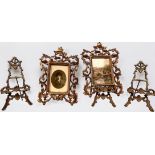 Three gilt-metal picture frames modelled as easels, together with two gilt-metal floral scrolled