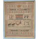 A George VI May 12th 1937 Coronation sampler, decorated with King/Queens guards and the Royal