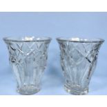 A pair of heavy glass vases by Baccarat, with etched mark to bases, 21cm high (Chip to rim of one)