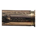 A Victorian gold cased propelling fountain pen, hexagonal shaped with foliate scroll decoration, and