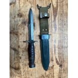 A WW2 American M4 Knife Bayonet By "ACC," with 6 3/4 inch, single edged steel blade with back edge