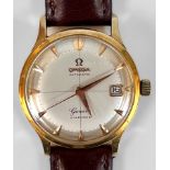 A gents 18ct gold Omega automatic Geneve Calendar, the silvered crosshair pie pan dial with