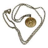 A 9ct gold St Christopher pendant, suspended on a 9ct yellow gold belcher chain, approximately 25