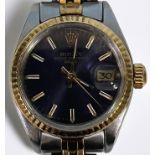 A ladies Rolex ‘Rolesor’ Oyster Perpetual Date wristwatch, model 6917, C.1979 the blue dial with
