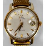 A 9ct gold Omega Seamaster automatic wristwatch, the silvered dial with applied gilt batons denoting