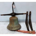 A cast bronze ship's bell, from a Dutch ship and cast around the shoulder 'I LIERA BOOLENS AMSTERDAM