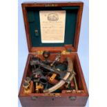 A cased Class A No. 5907 sextant, in mahogany box, black lacquer body with brass arc and