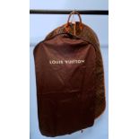 Louis Vuitton Monogram Suit Carrier, Double-sided canvas monogram, with leather handles and seam