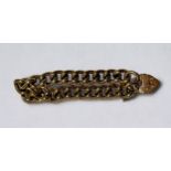 A 9ct gold heavy curb link bracelet, with bark effect clasp, gross weight approximately 74g