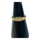 An 18ct yellow gold dress ring, set with five Victorian cut diamonds, estimated total weight of