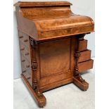 A Victorian walnut veneered Davenport desk, with secret button to operate the rising stationary
