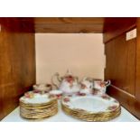 A Royal Albert porcelain part-teaset in the 'Old Country Roses' pattern, including teapot, cream and