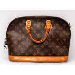 Louis Vuitton, a monogram Alma handbag, designed with a monogram coated canvas exterior, smooth