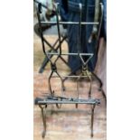 A wrought iron log cradle and fire-iron stand