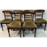A set of six William IV rosewood standard dining chairs, tablet crest rails with acanthus scrolled