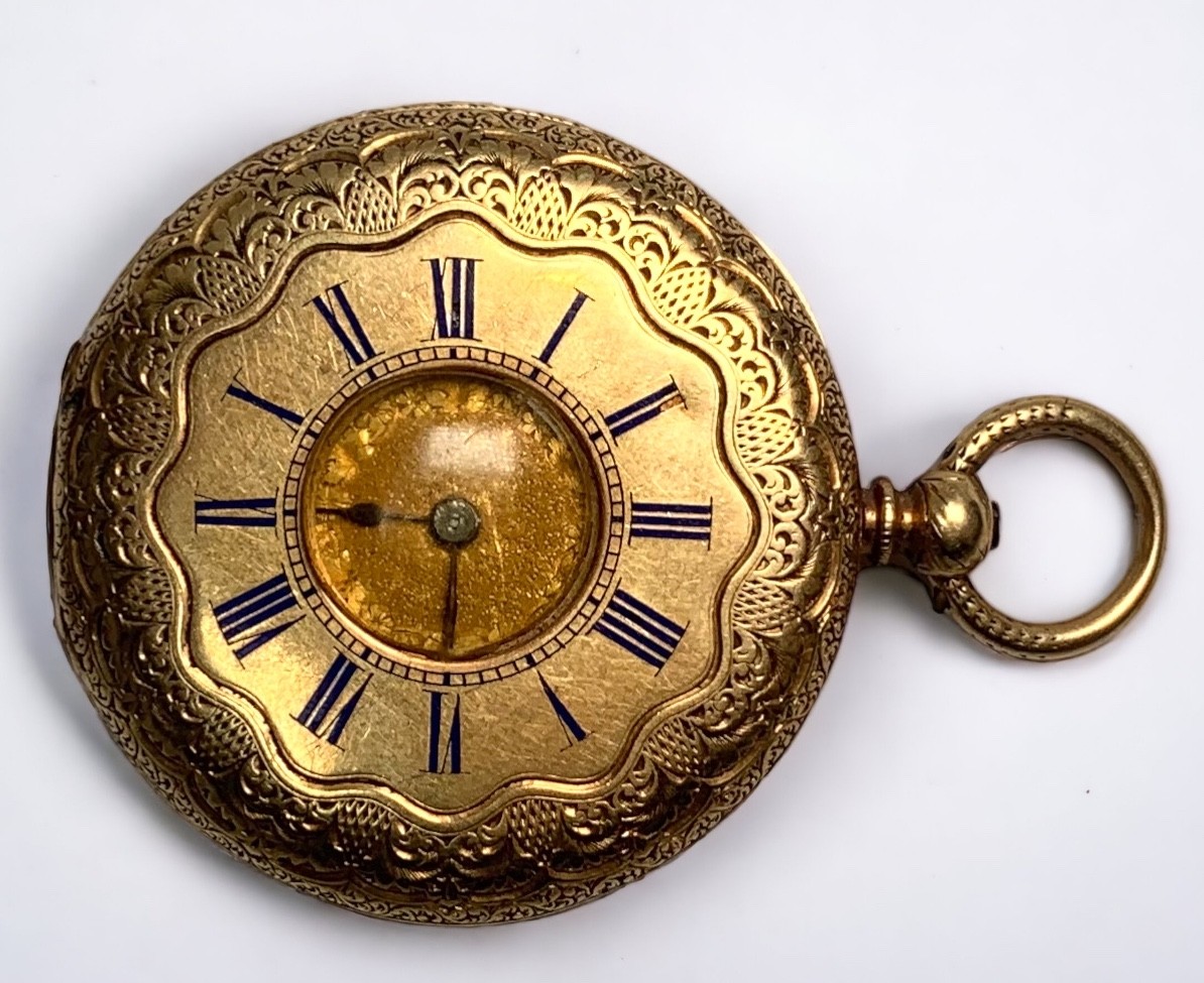 A small 18ct gold half-hunter pocket watch, the gilt dial with Roman numerals denoting hours,