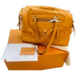 A Louis Vuitton yellow leather Luminous PM handbag, Monogram Empreinte leather, with two flat top